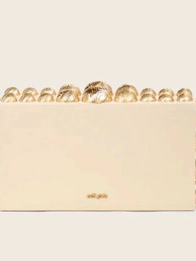 Yadira cult gaia Cream Clutch with Gold Shell Embellishments